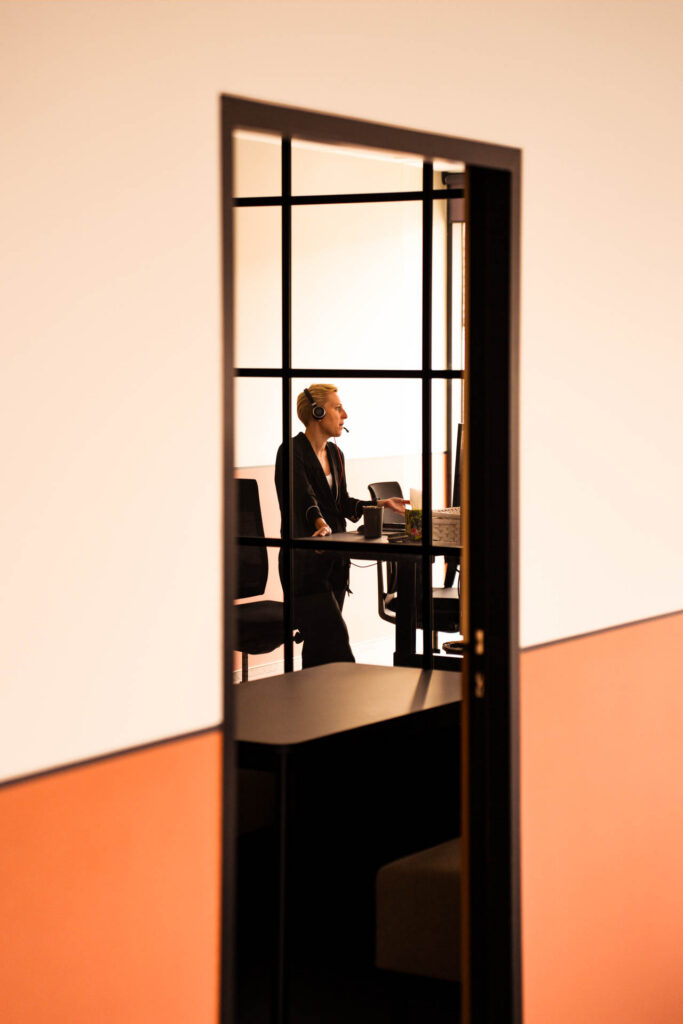 Darize employee looking through client cases at a computer