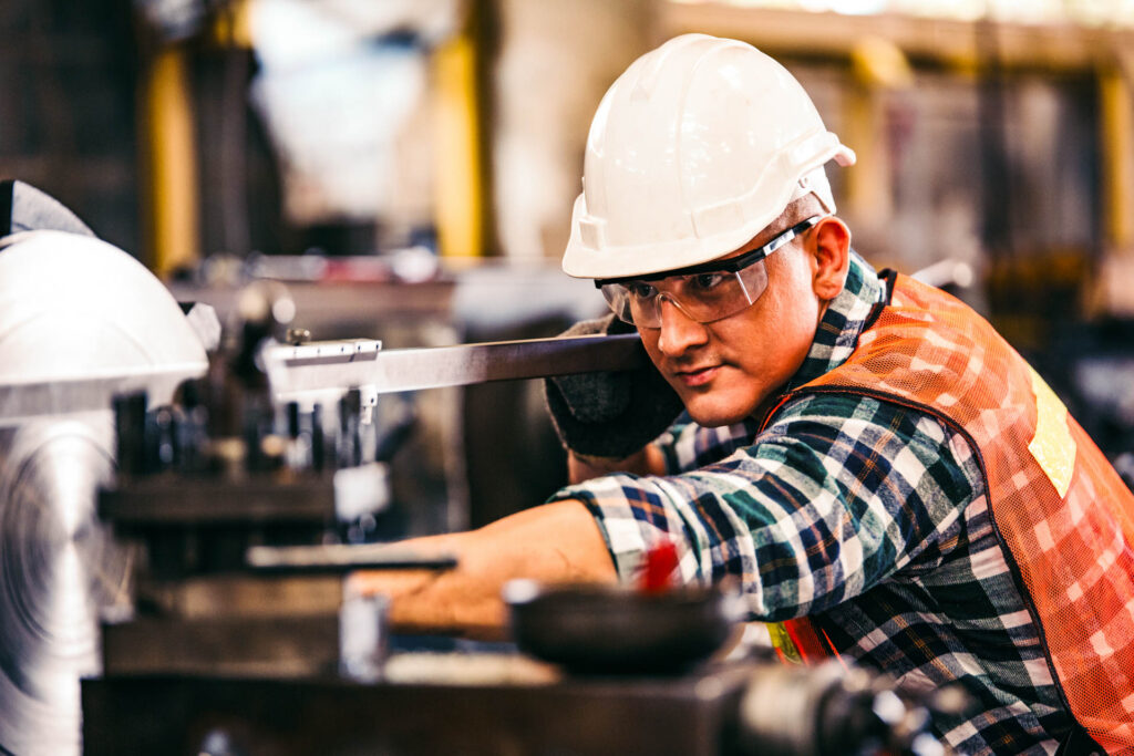 Industrial engineer checks work in a factory