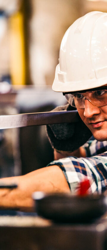 Industrial engineer checks work in a factory