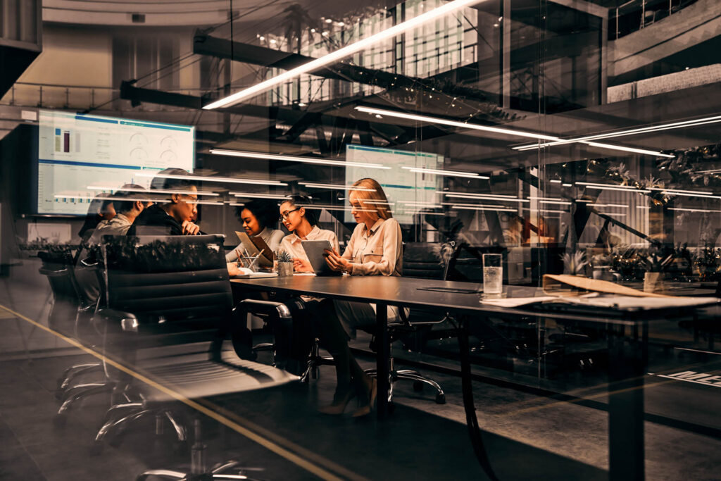 Modern business. Business men and women in a meeting