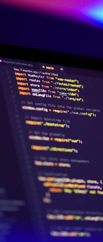 Computer screen displaying data analytics and programming code